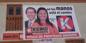 Keiko Fujimori campaign poster posing with her father