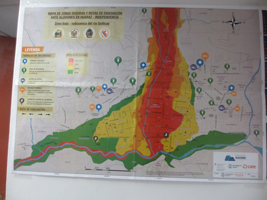 A poster showing the risk posed by Laguna Palcacocha above Huaraz.