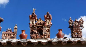 Intricate clay churches on a rooftop in Ayacucho.