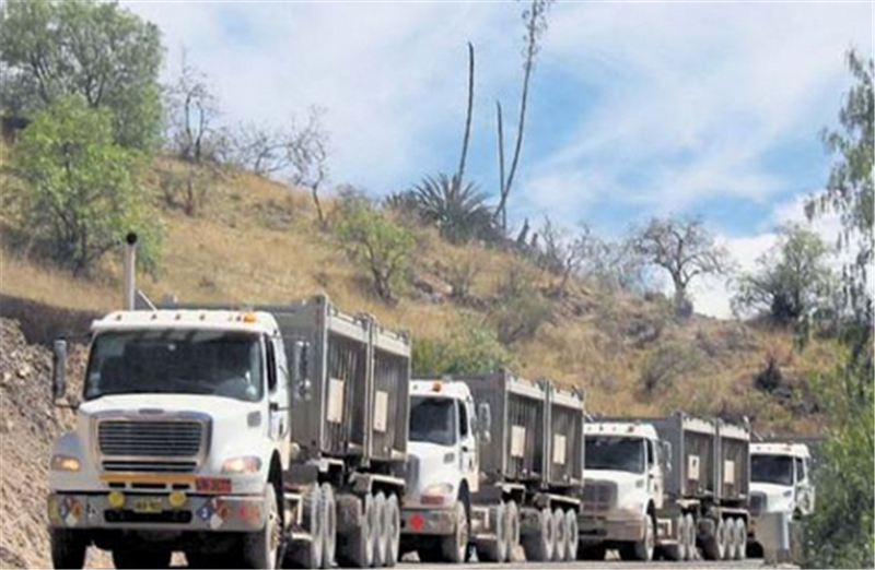 Convoys of mineral transport trucks on the road from the Las Bambas mine